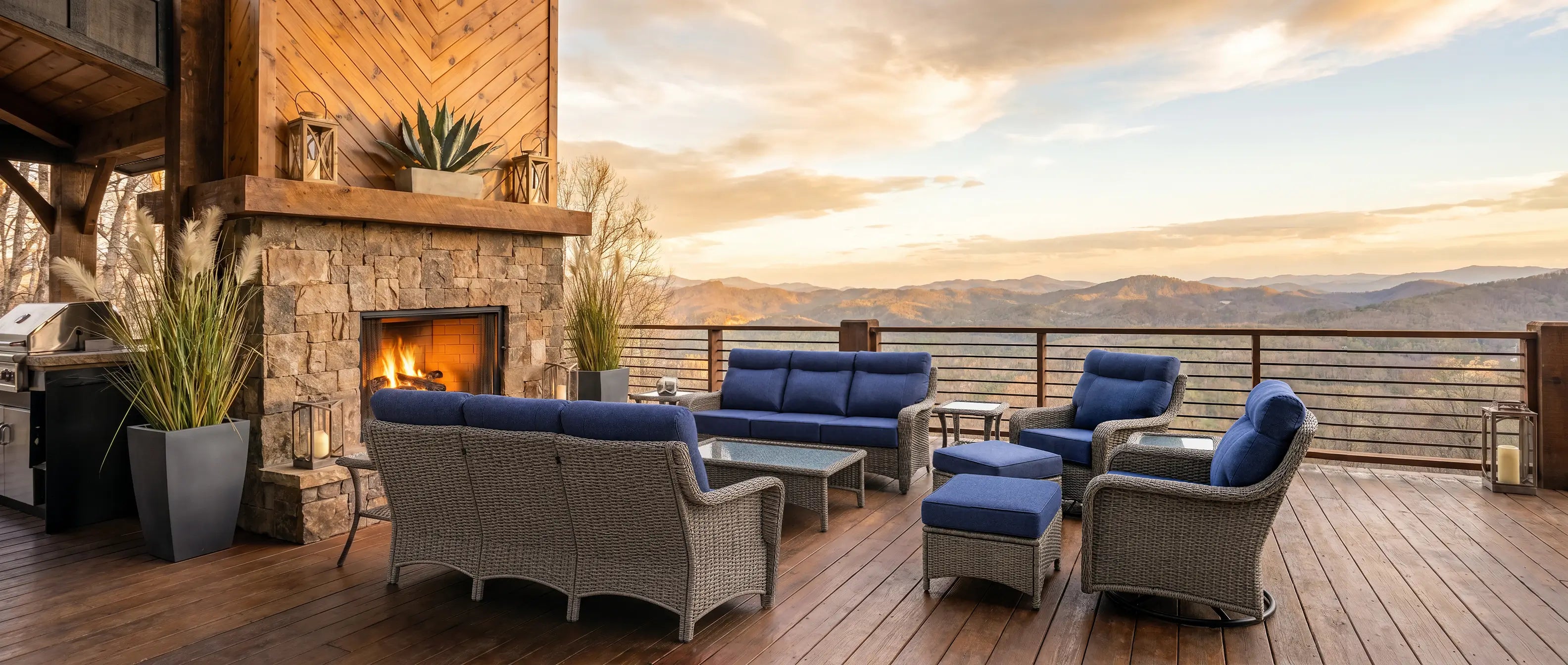 OuterCraft 10-piece outdoor wicker sectional furniture suite with 3-seater sofas, swivel rocker chairs, ottomans, coffee table, and side tables in Blue Olefin cushions on mountain view deck
