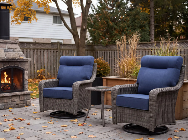 OuterCraft 3-piece dark PE rattan patio set with swivel chairs, side table, and blue cushions on autumn patio.