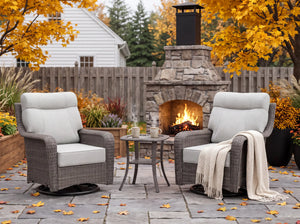 OuterCraft 3-piece dark PE rattan patio set with swivel chairs, side table, and light gray cushions on autumn patio.
