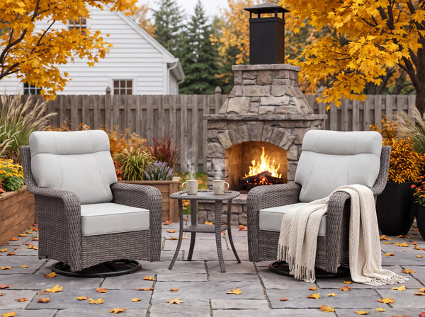 OuterCraft 3-piece dark PE rattan patio set with swivel chairs, side table, and light gray cushions on autumn patio.