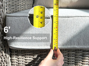 Tape measure verifying 6-inch thick OuterCraft high-resilience patio cushion with light gray weather-resistant fabric