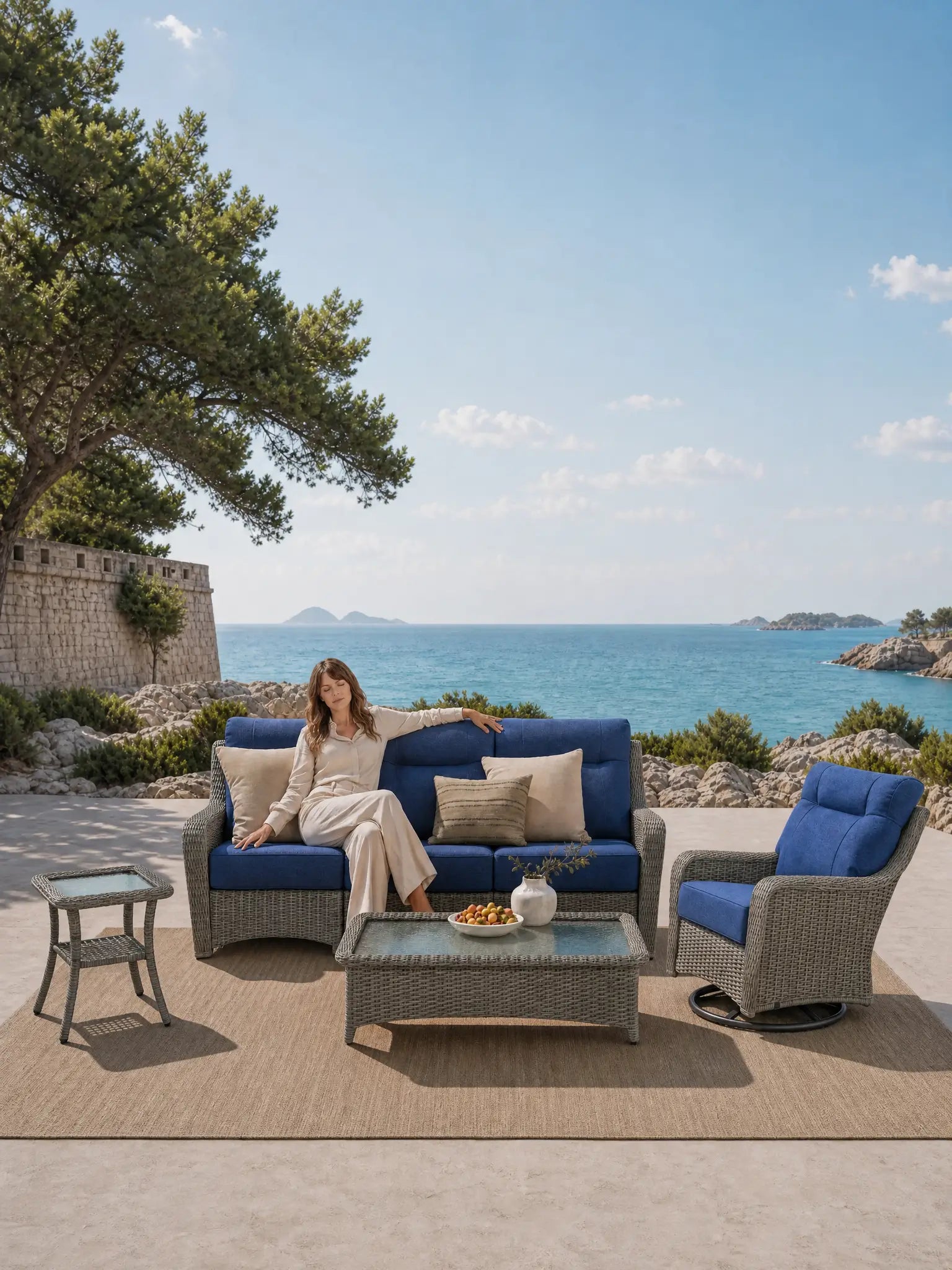OuterCraft 7-piece all-weather rattan patio seating with ergonomic high-back Blue Olefin cushions and 360-degree swivel rocker