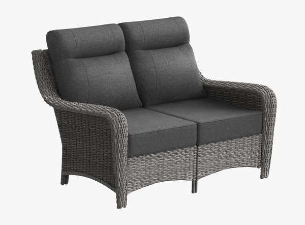 OuterCraft dark PE rattan outdoor loveseat with 6-inch thick dark gray cushions on clean white background.