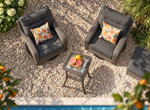 OuterCraft dark PE rattan swivel chairs, side table, ottoman, and dark gray cushions styled by a poolside patio.
