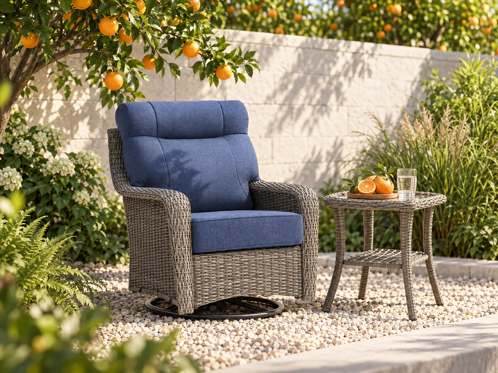 OuterCraft dark rattan swivel rocker chair with dark gray cushions and side table upgrade on white.