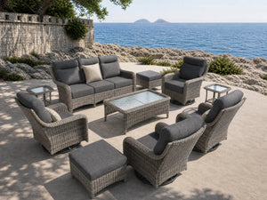 OuterCraft 10-piece dark PE rattan patio furniture set with 3-seater sofas, swivel rocker chairs, ottomans and dark gray cushions styled on a grand estate patio