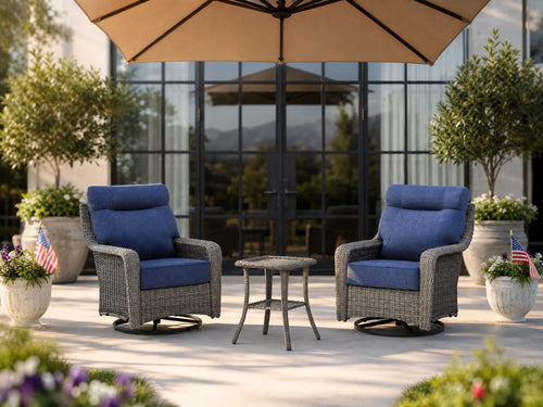 OuterCraft 3-piece dark PE rattan 360-degree swivel rocker chairs and side table set with 6-inch thick blue cushions styled on a grand estate patio