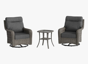 OuterCraft 3-piece dark PE rattan 360-degree swivel rocker chairs and side table set with 6-inch thick dark gray cushions on clean white background