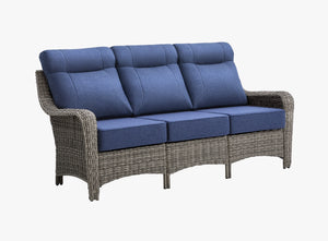 OuterCraft 3-seater all-weather dark PE wicker sofa with 6-inch thick blue cushions on clean white background