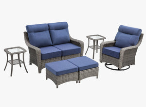 OuterCraft 6-piece dark PE rattan patio set with loveseat, 360-degree swivel rocker chairs, ottomans and side table set with 6-inch thick blue cushions on clean white background