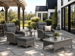 OuterCraft 6-piece dark PE rattan 360-degree swivel rocker chairs, ottomans, coffee table and side table set with 6-inch thick dark gray cushions styled on a grand estate patio