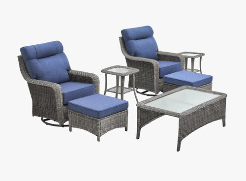 OuterCraft 7-piece dark PE rattan 360-degree swivel rocker chairs, ottomans, coffee table and side table set with 6-inch thick blue cushions on clean white background