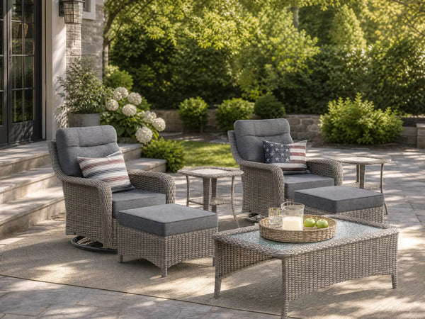OuterCraft 7-piece dark PE rattan 360-degree swivel rocker chairs, ottomans, coffee table and side tables set with 6-inch thick dark gray cushions on a grand estate patio
