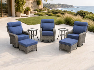 OuterCraft 7-piece dark PE rattan 360-degree swivel rocker chairs, ottomans and side table set with 6-inch thick blue cushions styled on a grand estate patio