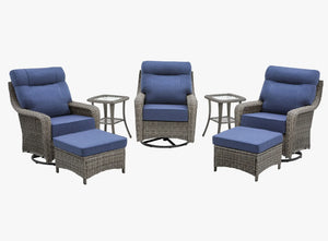 OuterCraft 7-piece dark PE rattan 360-degree swivel rocker chairs, ottomans and side table set with 6-inch thick blue cushions on clean white background