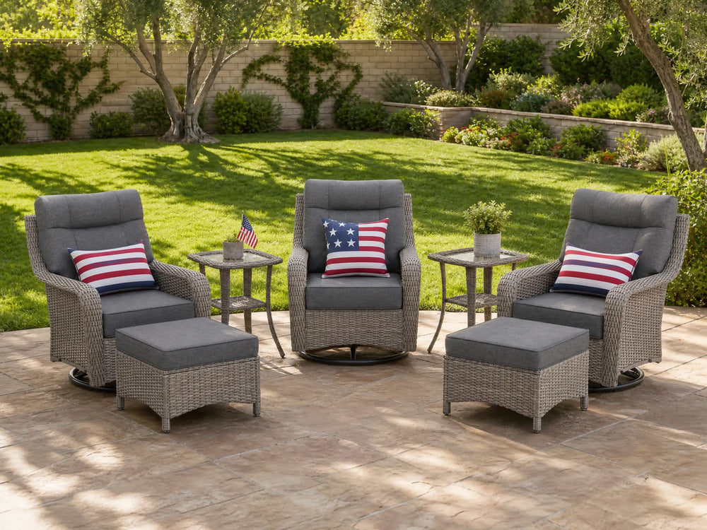 OuterCraft 7-piece dark PE rattan 360-degree swivel rocker chairs, ottomans and side table set with 6-inch thick dark gray cushions styled on a grand estate patio