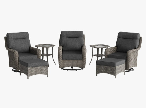 OuterCraft 7-piece dark PE rattan 360-degree swivel rocker chairs, ottomans and side table set with 6-inch thick dark gray cushions on clean white background