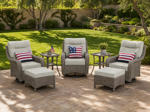 OuterCraft 7-piece dark PE rattan 360-degree swivel rocker chairs, ottomans and side table set with 6-inch thick light dark cushions styled on a grand estate patio