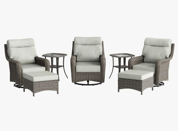 OuterCraft 7-piece dark PE rattan 360-degree swivel rocker chairs, ottomans and side table set with 6-inch thick light gray  cushions on clean white background