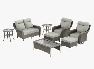 OuterCraft 8-piece dark PE rattan patio set with loveseat, 360-degree swivel rocker chairs, ottomans, coffee table and side table set with 6-inch thick light gray cushions on clean white background