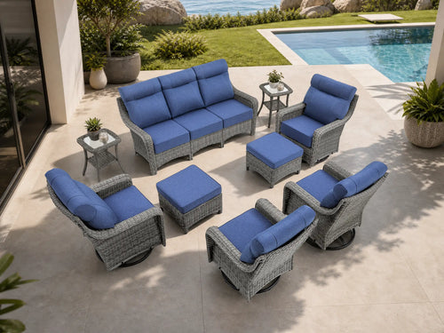 OuterCraft 9-piece dark PE rattan patio furniture set with 3-seater sofa, swivel rocker chairs, ottomans, side tables and blue cushions styled on a grand estate patio