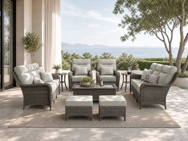 OuterCraft 9-piece dark PE rattan patio set with 3-seater sofas, 360-degree swivel rocker chairs, ottomans, coffee table and side tables with 6-inch thick light gray cushions styled on a grand estate patio