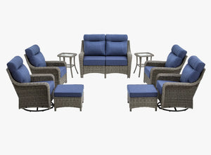 OuterCraft 9-piece dark PE rattan patio set with loveseat, 360-degree swivel rocker chairs, ottomans and side table set with 6-inch thick blue cushions on clean white background
