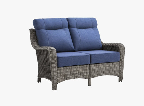 OuterCraft all-weather dark PE rattan loveseat and 6-inch thick blue cushions on clean white background