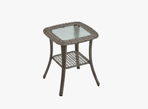 OuterCraft dark PE rattan hand-woven side table with glass top on clean white background