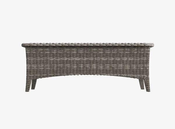 Macro product detail showcasing the tight-weave, premium dark resin wicker texture of an OuterCraft Monolith outdoor furniture piece, engineered for all-weather durability and high-end aesthetic precision.