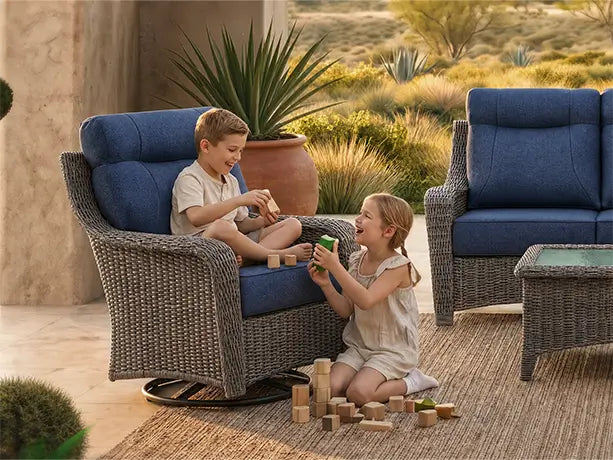OuterCraft 360-degree swivel rocker patio armchair with ergonomic high-back support and blue Olefin cushions in family patio setting